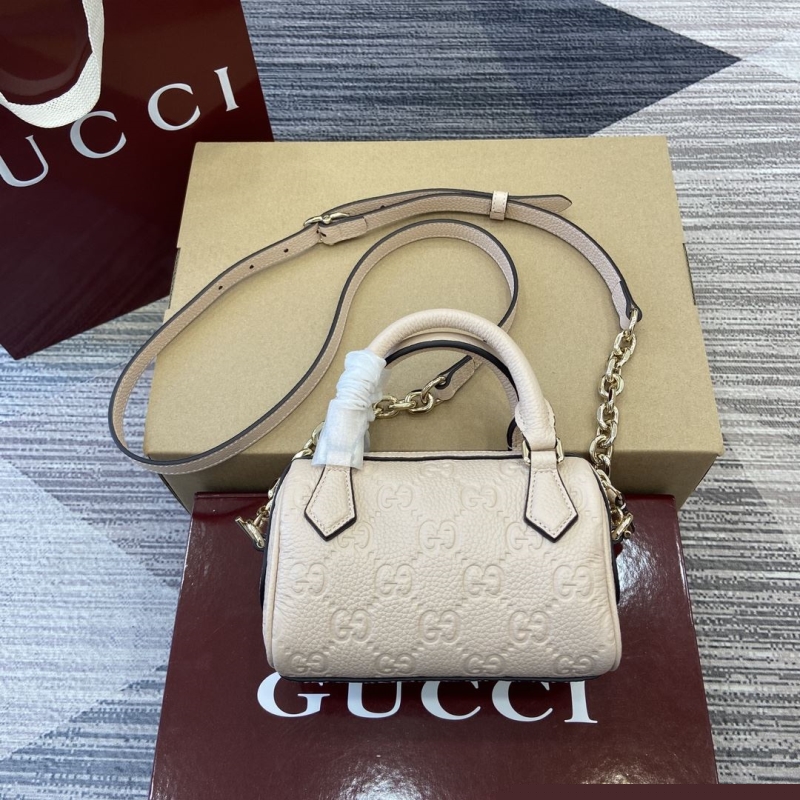 G*u*i top handle bags